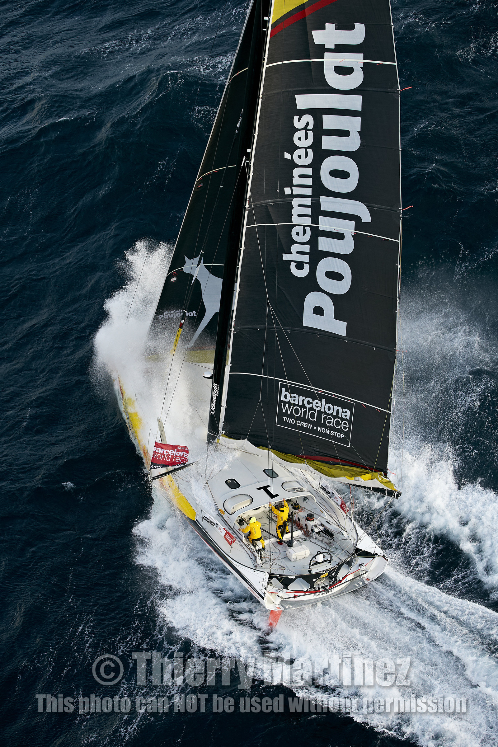 2014 BARCELONA WORLD RACE. Bernard Stamm (SUI) & Jean Le Cam (FRA) on CHEMINEES POUJOULAT