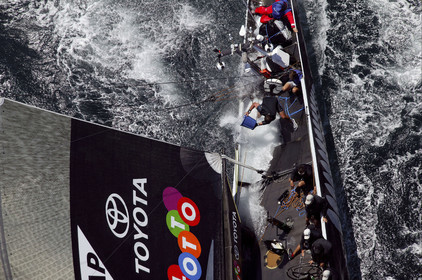 03_0176D ©Th.Martinez - Auckland (NZ) . America's Cup 2003. 15th February 2003. Day 1..Alinghi (SUI 64) vs Team NZ (NZL 82) .NZL 82 in first minutes of Race 1 before retiring on damage. Alinghi 1- Team NZ 0.