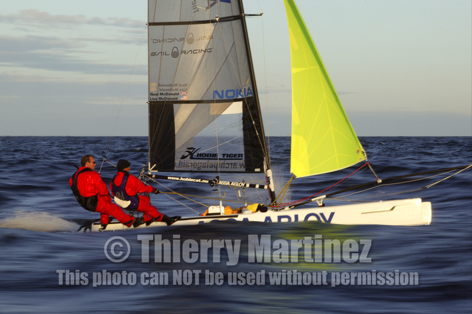 03_3219D © Th.Martinez,STOCKHOLMSWEDEN10 07 03-Archipelago Raid (2003).Leg 4, way back from Finland to Sweden. Lisa and Neal McDonald on ASSA ABLOY full speed.