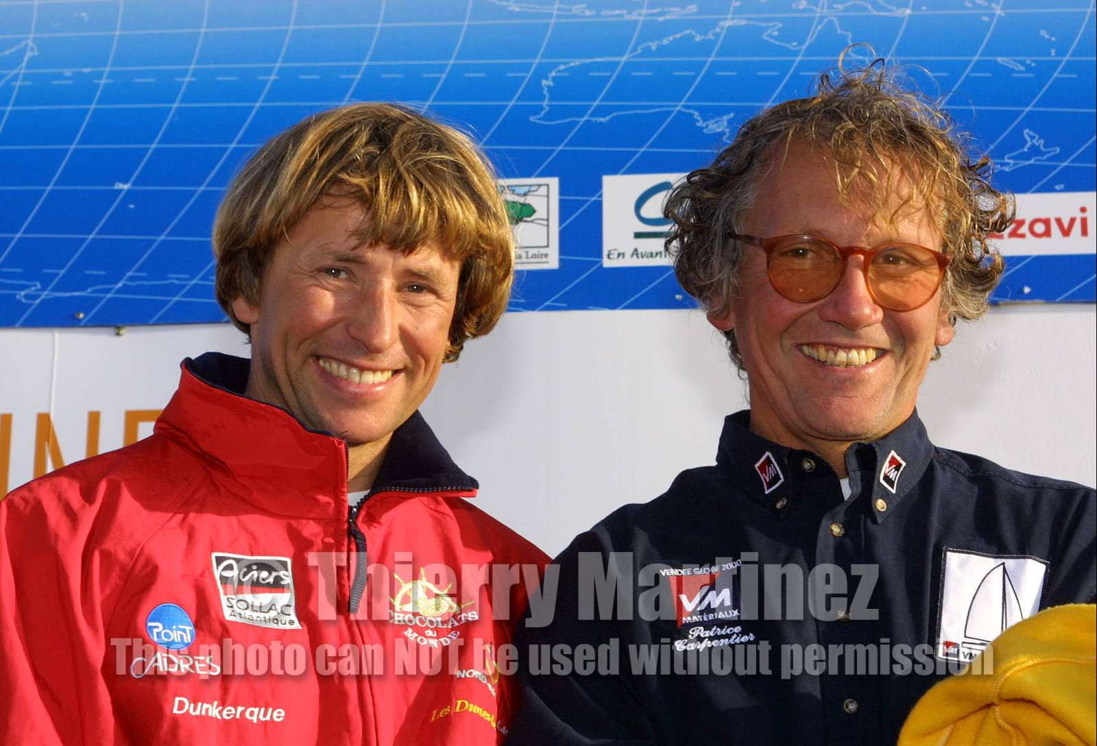 ©ThMartinez. Vendee Globe finish. Les Sables d'Olonne (FRA),5 mars 2001..Joe Seeten (FRA) Region Nord Pas de Calais-Chocolats du Monde 10éme en.115jours 16h 46mn, et Patrice Carpentier (FRA) VM Materiaux 11éme en .116 jours 0h 32mn 18s.