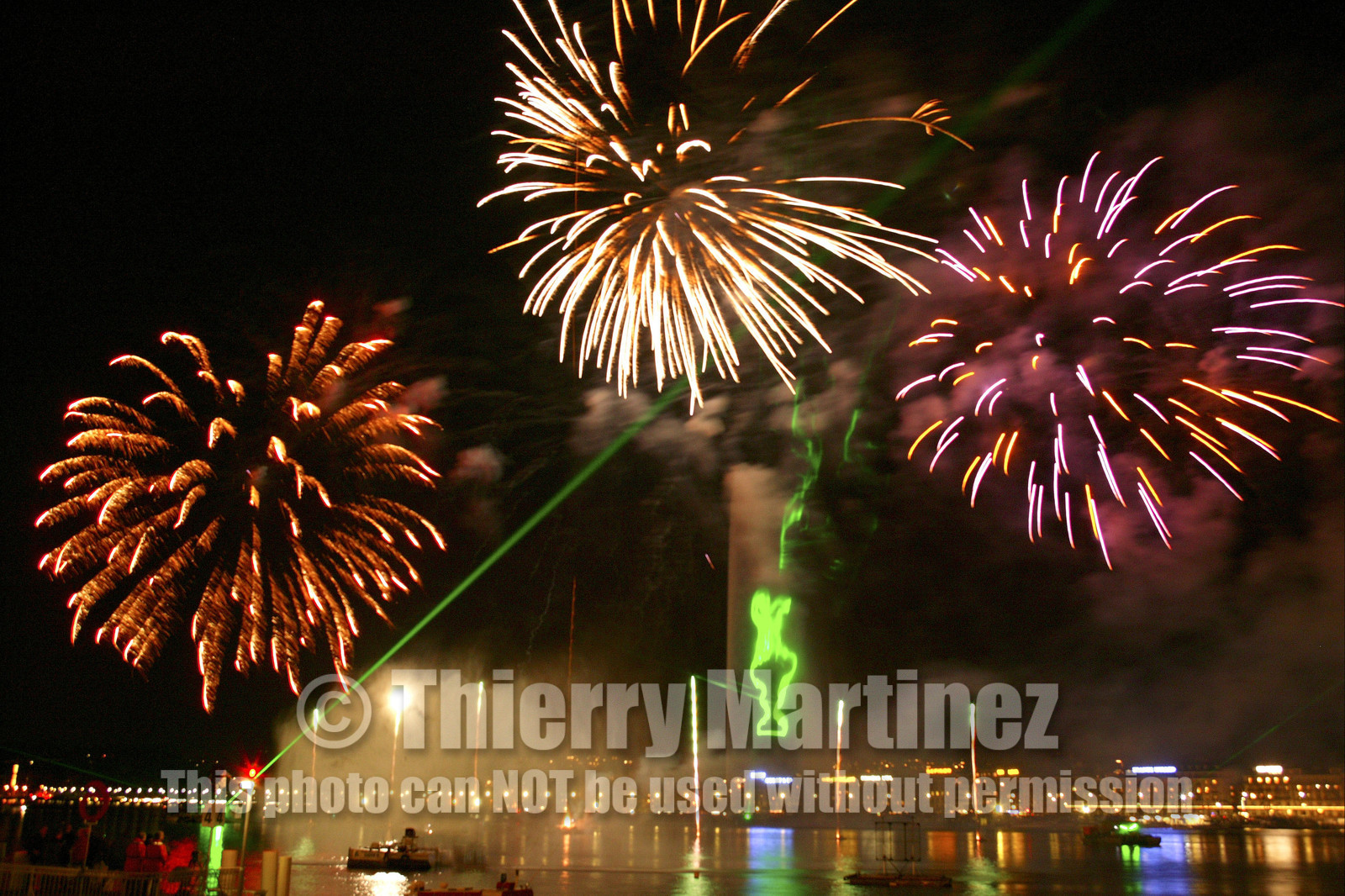 03_2277D ©Th.Martinez .Geneva , Switzerland. America's Cup 2003. 8th March 2003.Alinghi Team winner of America's Cup 2003..Welcome to Alinghi Team in Geneva.Firework and laser show by the lac...