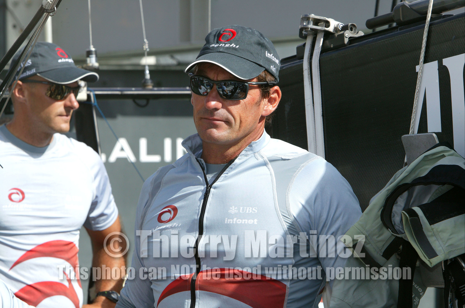 03_0875D © Th.Martinez. Auckland   New Zealand. 15 02 03 America's Cup Day 1.Alinghi (SUI64) vs Team New Zealand (NZL82)Alinghi Team onboard SUI64 leaving the dock for the first race day of the America's Cup 2003..Thierry Chappet and Pieter Van Nieuwenhuyzen.
