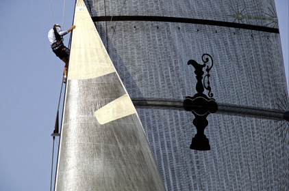 03_0205D ©Th.Martinez - Auckland (NZ) . America's Cup 2003. 18th February 2003. Day 2..Alinghi (SUI 64) vs Team NZ (NZL 82) .Team NZ's traveller Nick Heron in NZL 82  mast during pretsart of race 2....