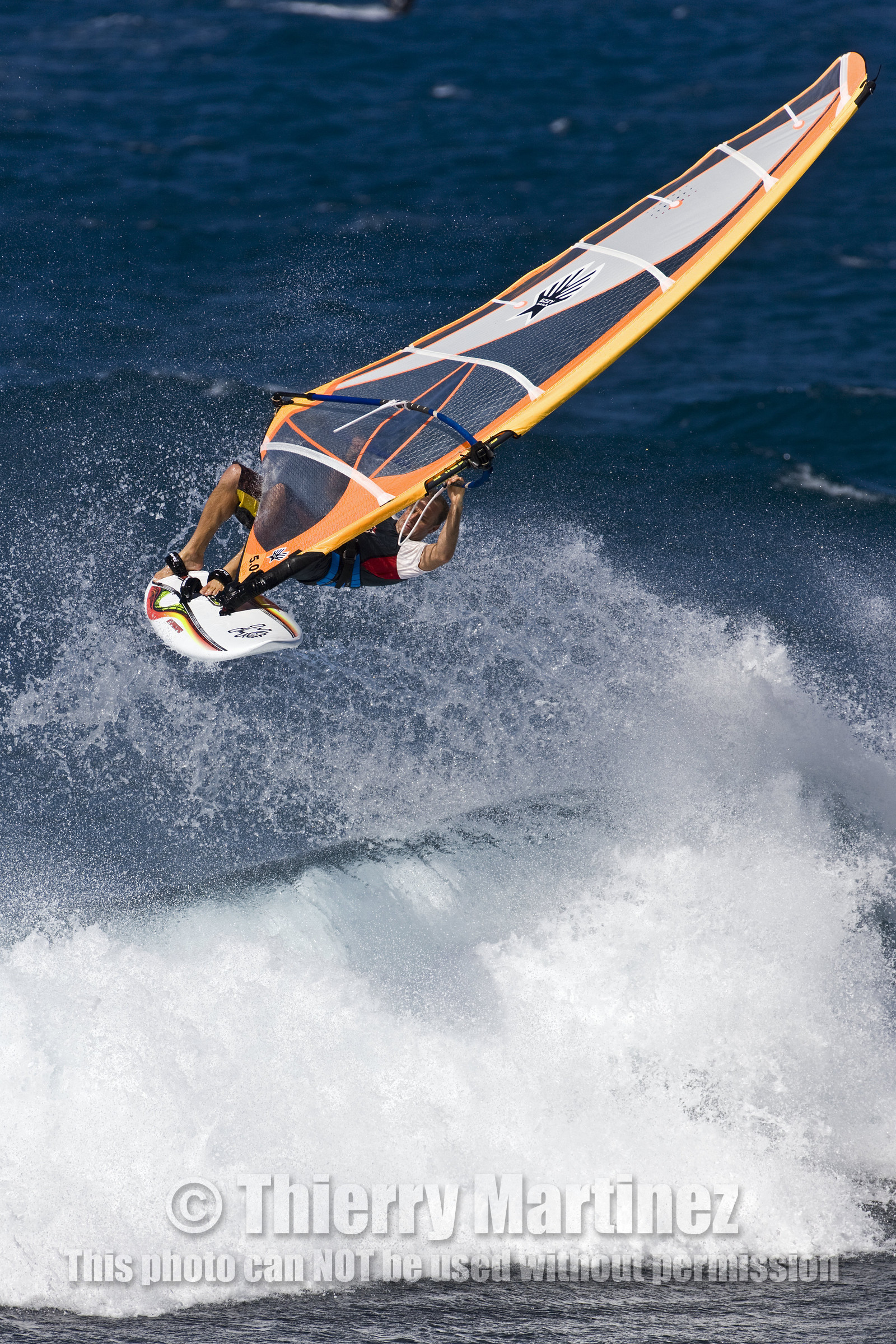 Windsurf in waves at Hookip'a Beach - North Shore Maui - Hawaii.