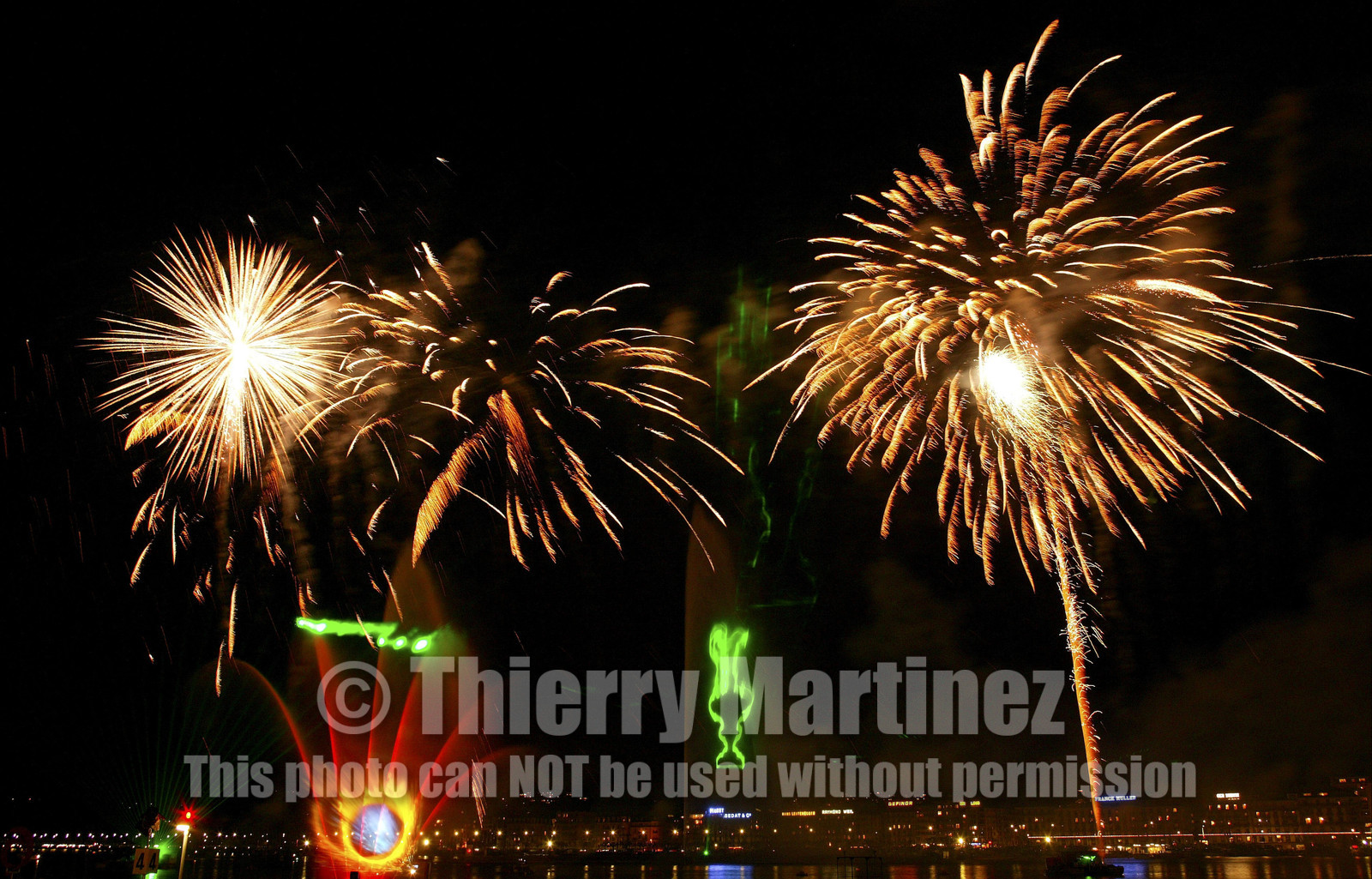 03_2273D ©Th.Martinez .Geneva , Switzerland. America's Cup 2003. 8th March 2003.Alinghi Team winner of America's Cup 2003..Welcome to Alinghi Team in Geneva.Firework and laser show by the lac...