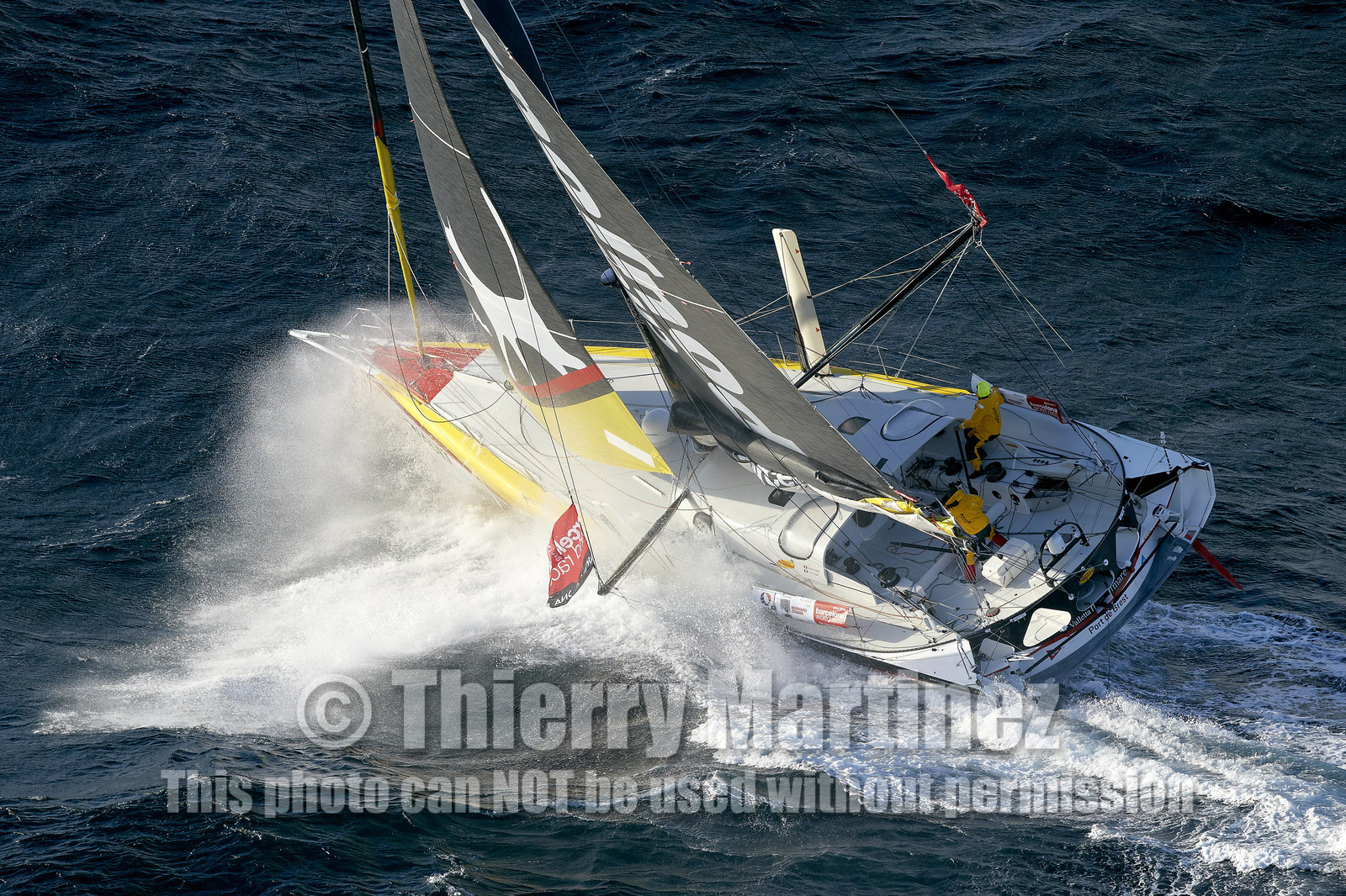 2014 BARCELONA WORLD RACE. Bernard Stamm (SUI) & Jean Le Cam (FRA) on CHEMINEES POUJOULAT