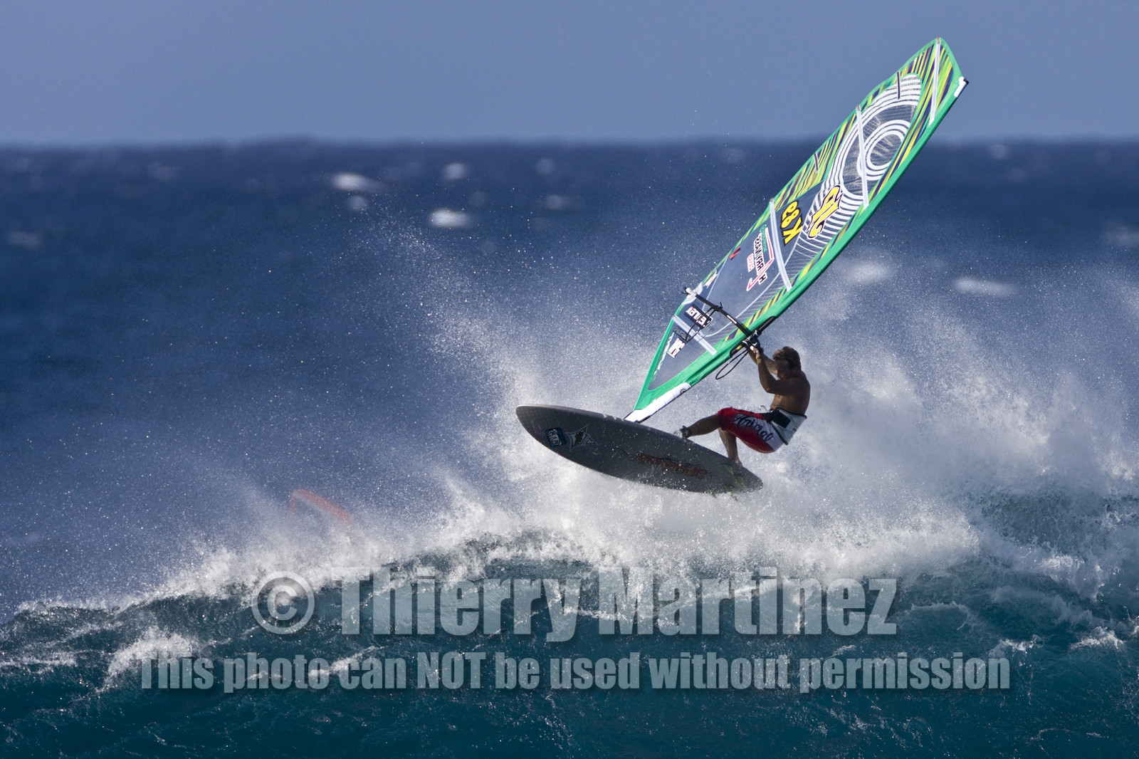 Windsurf in waves at Hookip'a Beach - North Shore Maui - Hawaii.