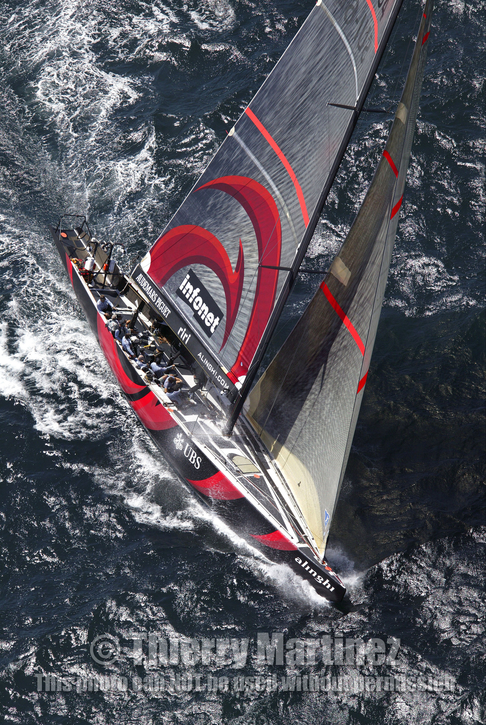 03_2402D ©Th.Martinez Team .Auckland , New Zealand. America's Cup 2003. 15th February 2003..Alinghi Team (SUI 64) vs Team NZ (NZL 82) . Race 1..SUI 64.