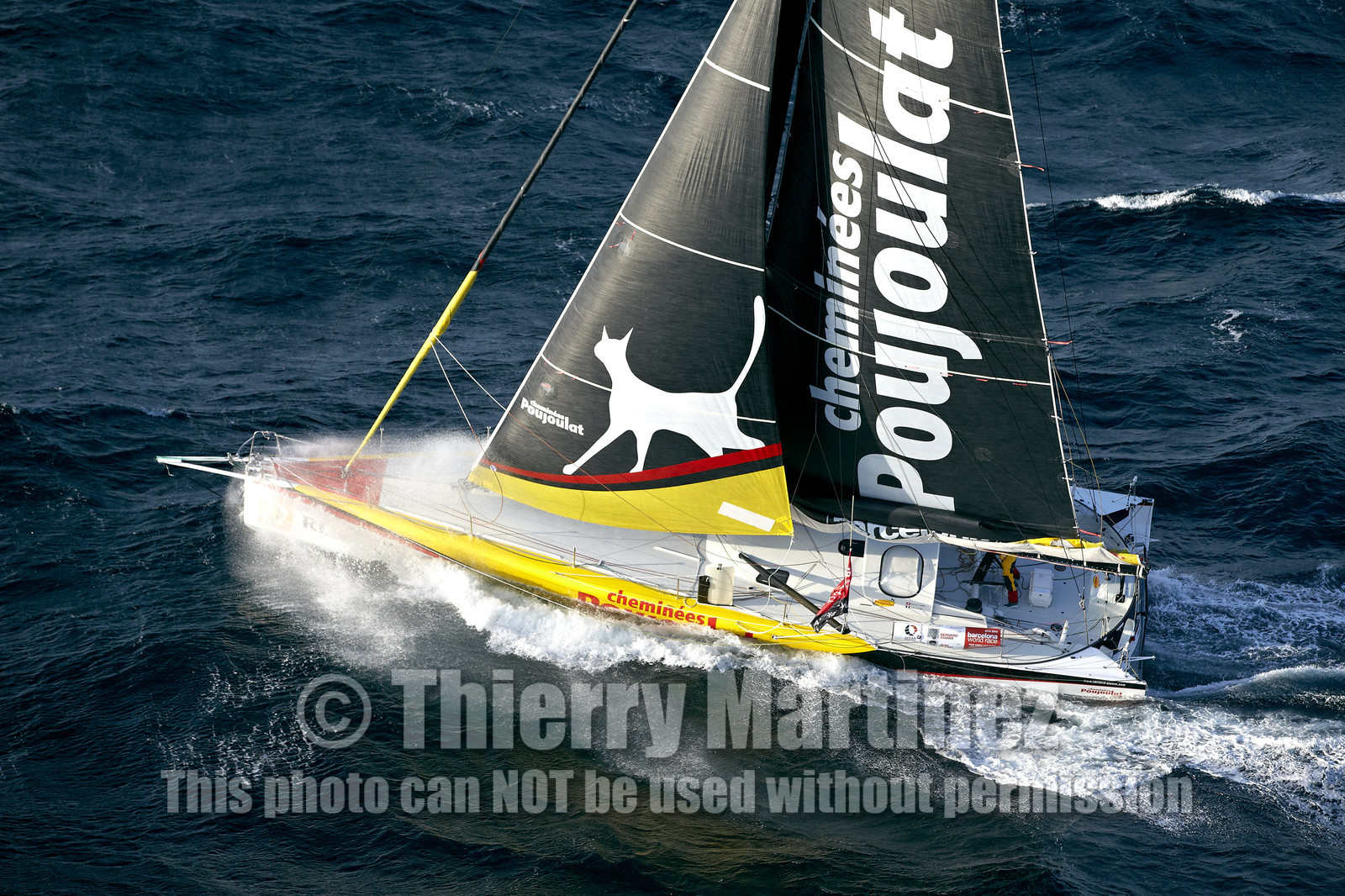 2014 BARCELONA WORLD RACE. Bernard Stamm (SUI) & Jean Le Cam (FRA) on CHEMINEES POUJOULAT