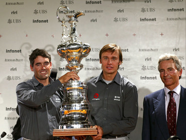 03_2231D ©Th.Martinez .Geneva , Switzerland. America's Cup 2003. 8th March 2003.Alinghi Team winner of America's Cup 2003, arriving in Geneva Airport with thE America's Cup..Russell Coutts (Alinghi's skipper) and Ernesto Bertarelli, holding the America's cup , next to SNG commodore Pierre Yves Firminich...