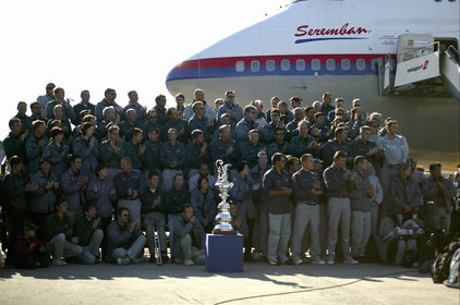 03_2213D ©Th.Martinez Team .Geneva , Switzerland. America's Cup 2003. 8th March 2003.Alinghi Team winner of America's Cup 2003, arriving in Geneva Airport with thE America's Cup..All Alinghi Team behing the America's Cup at Genava airport ....