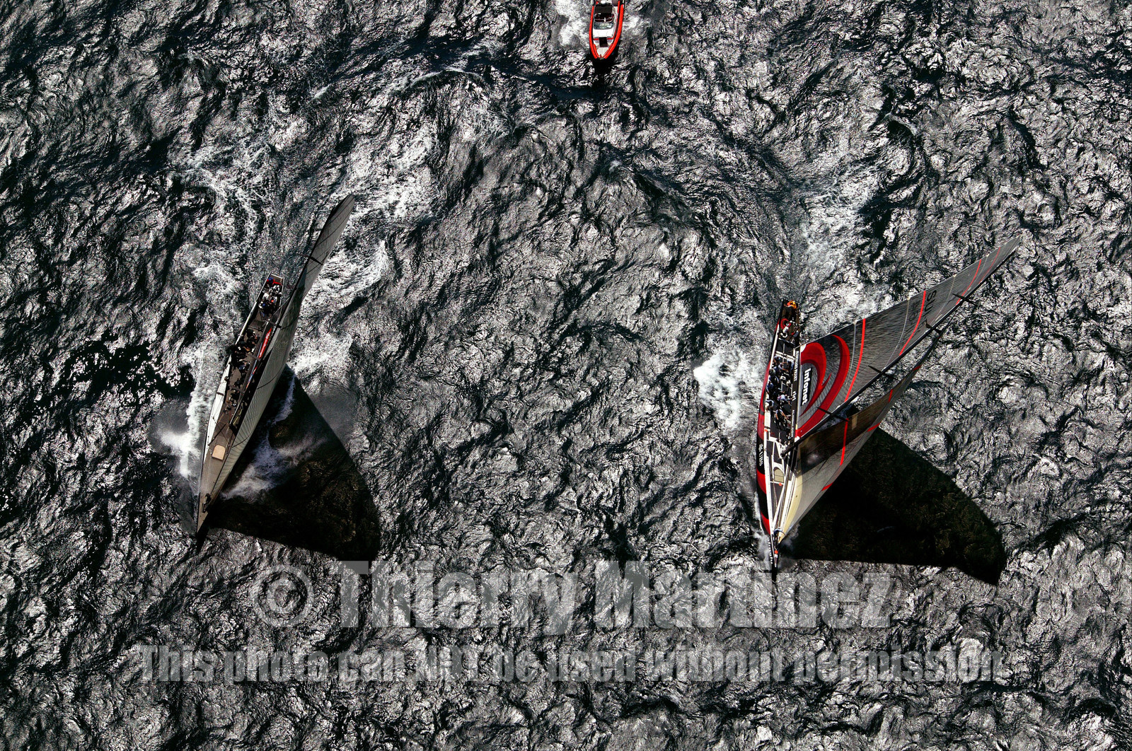 03_0887D © Th.Martinez. Auckland   New Zealand. 15 02 03 America's Cup Day 1.Alinghi (SUI64) vs Team New Zealand (NZL82) First upwind leg, few minutes after the start.