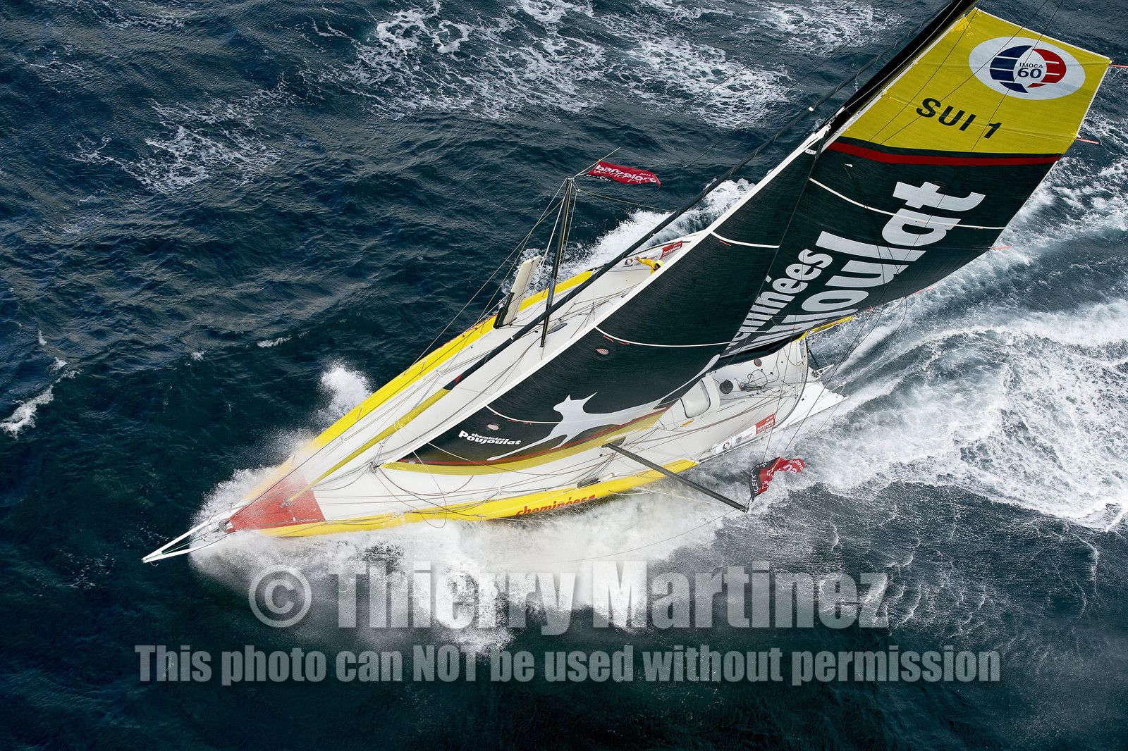 2014 BARCELONA WORLD RACE. Bernard Stamm (SUI) & Jean Le Cam (FRA) on CHEMINEES POUJOULAT