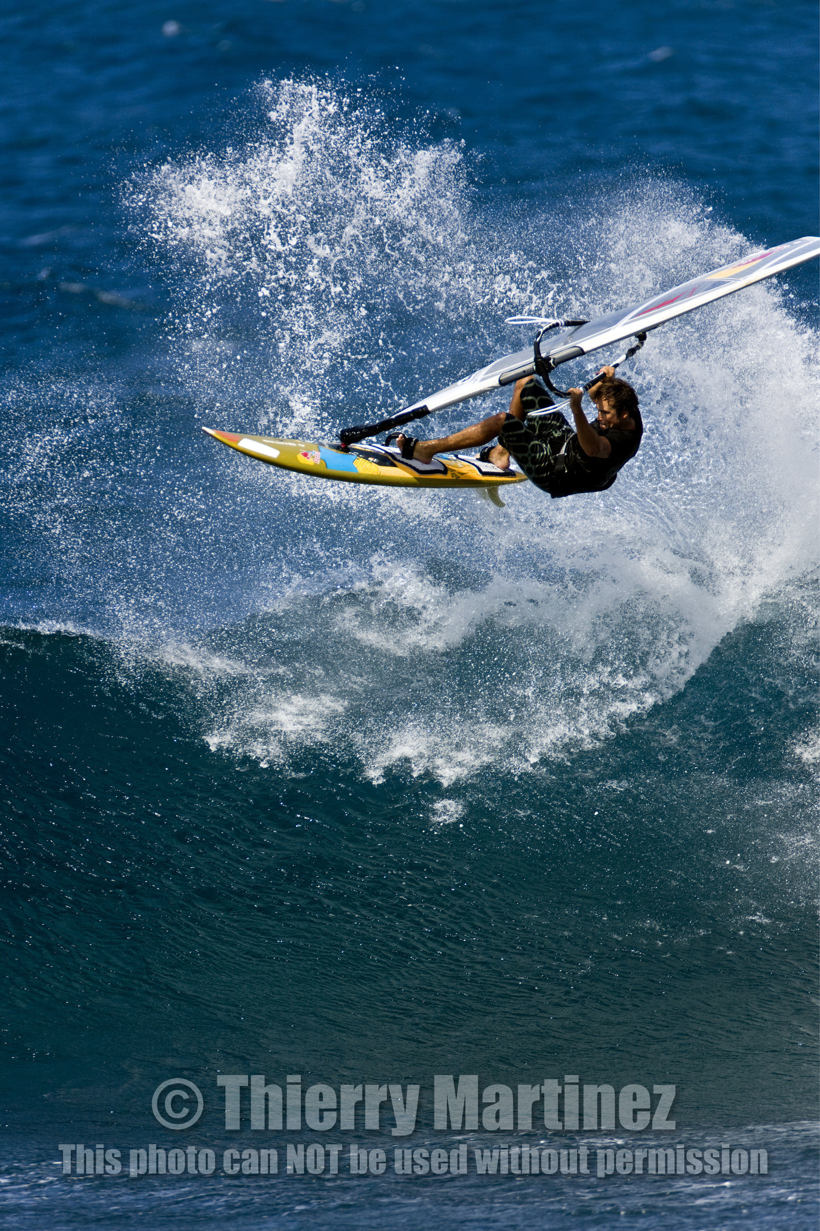 Windsurf in waves at Hookip'a Beach - North Shore Maui - Hawaii.