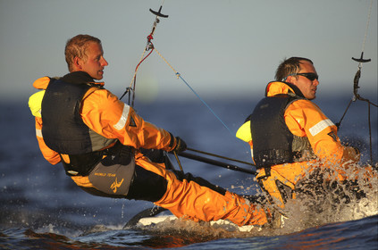 03_3215D  © Th.Martinez,STOCKHOLM - SWEDEN10 07 03-Archipelago Raid (2003). Leg4: Marieham (Finland) TO Fejan (SWE). Team Nokia - Kempff , Magnus Nordstrom looking at the map and Joakim Kempff at the helm.