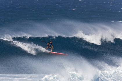 Stand Up Paddle  in waves at Hookip'a Beach - North Shore Maui - Hawaii.