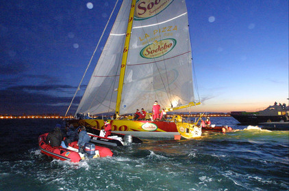 ©Thierry Martinez   Sea&Co. Vendee Globe Finish. les Sables d'Olonne (FRA) 23th february 2001. 07h15 (local time).Thomas Coville (FRA) SODEBO finishing 6th in single handed round the world race, in 105days 7h 24mn..Thomas had crossed the finish line at 23h35mn the day before.