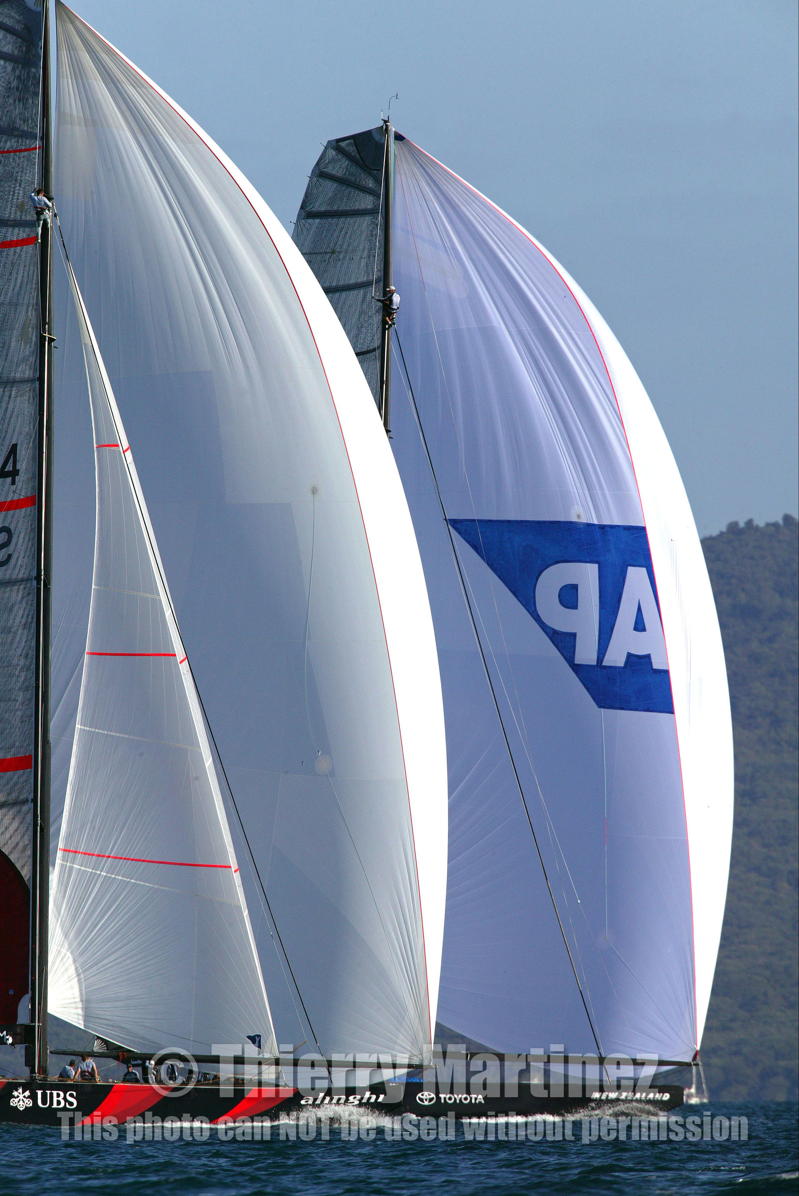 03_0951D © Th.Martinez  Auckland   New Zealand. 16 February 2003 America's Cup 2003, .Day 2 Alinghi (SUI64) vs Team New Zealand (NZL82) SUI64 during the last downwind leg.