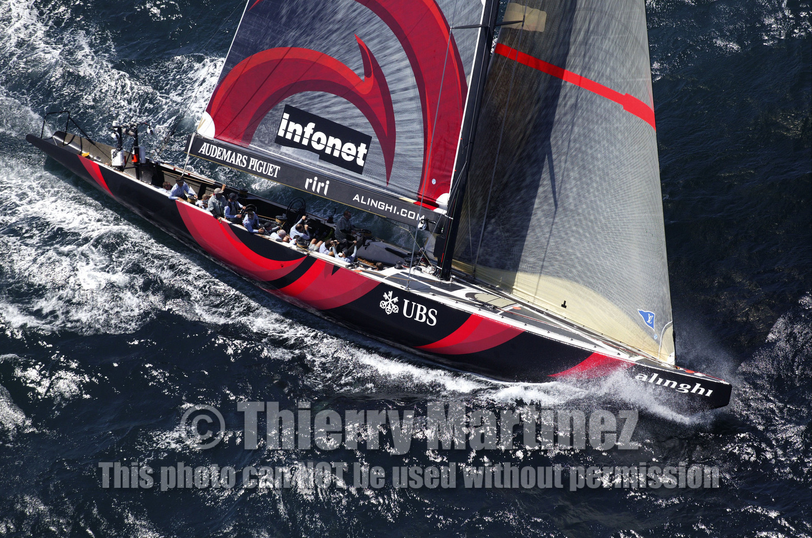 03_2400D  ©Th.Martinez .Auckland , New Zealand. America's Cup 2003. 15th February 2003..Alinghi Team (SUI 64) vs Team NZ (NZL 82) . Race 1..SUI 64.