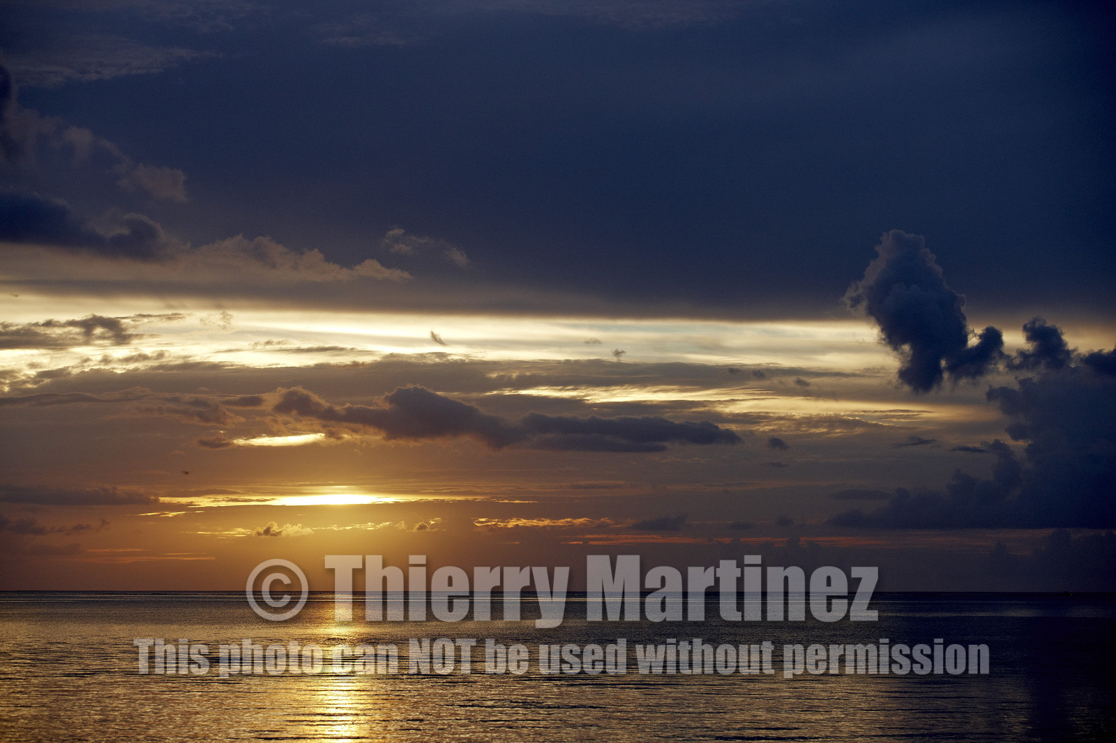 15_024694  ©ThMartinez Sea&Co.  RAIATEA - ILES SOUS LE VENT. POLYNESIE FRANCAISE .  2 Février 2015. ..SUNSET