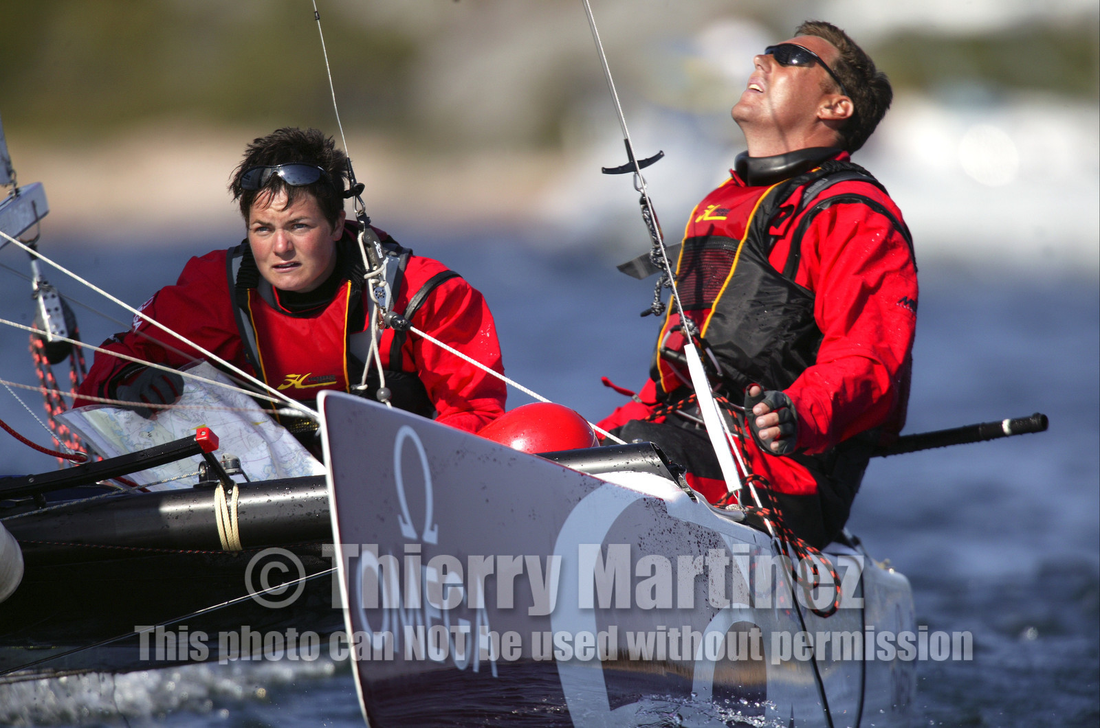 03_3080D  © Th.Martinez,STOCKHOLM ARCHIPELAGO - SWEDEN8 07 03-Archipelago Raid (2003)  Day 1.OMEGA Ellen MacArthur (UK) at navigation helm and NICK MOLONEY (AUS)   at the helm.