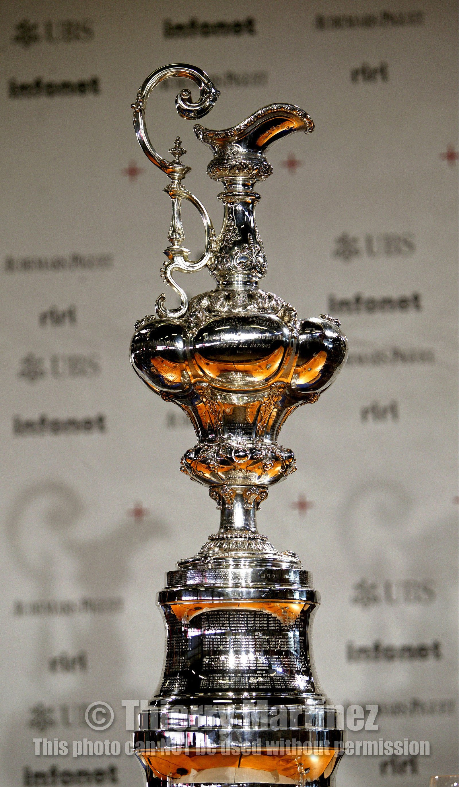 03_2218D ©Th.Martinez Team .Geneva , Switzerland. America's Cup 2003. 8th March 2003.Alinghi Team winner of America's Cup 2003, arriving in Geneva Airport with thE America's Cup..The CUP during Geneva Airport Press conference....