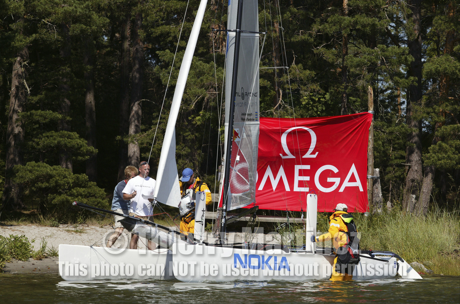 03_3059D © Th.Martinez,STOCKHOLM ARCHIPELAGO SWEDEN, 08 07 03-Archipelago Raid (2003)  Day 1..Team NOKIA-Kempff  Magnus Nordstrom (SWE)& Joakim Kempff (SWE) at a check-point.