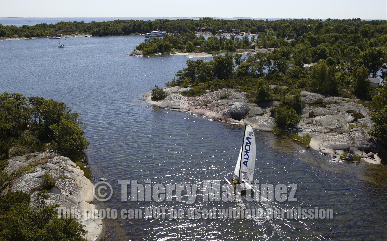 03_3097D © Th.Martinez,STOCKHOLM ARCHIPELAGO-SWEDEN9 07 03-Archipelago Raid (2003)  Leg 2.Team NOKIA arriving at RODLOGA check point.