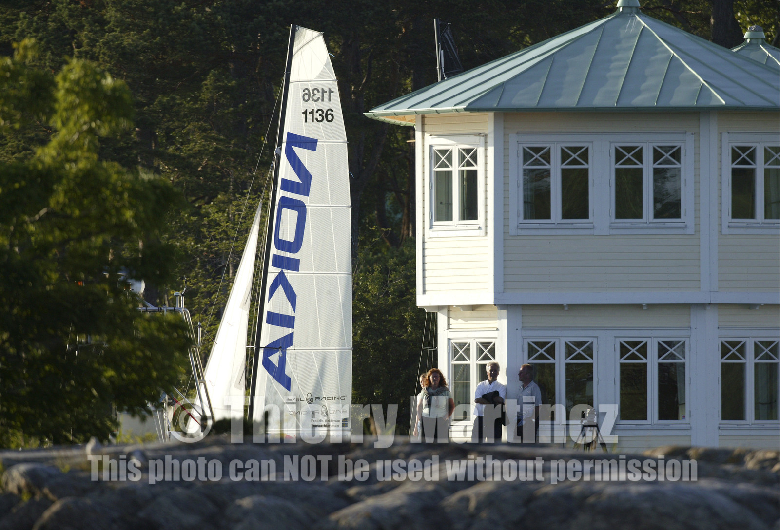 03_3086D © Th.Martinez,STOCKHOLM ARCHIPELAGO SWEDEN, 8 07 03-Archipelago Raid (2003)  Day 1. Team NOKIA-Adilstam  .Frederik Aldistam (SWe) and Tomas Marimon (SWE)  at finish of leg 1.