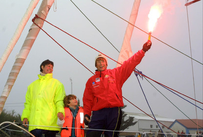 ©ThMartinez. Vendee Globe 2000. Les Sables d'Olonne (FRA) 5th March 2001..Joe Seeten (FRA) Region Nord pas de Calais-Chocolats du monde finish 10th .in his first single handed round the world in 115 days 16hours 45mns..With his wife Michou & son Damien.