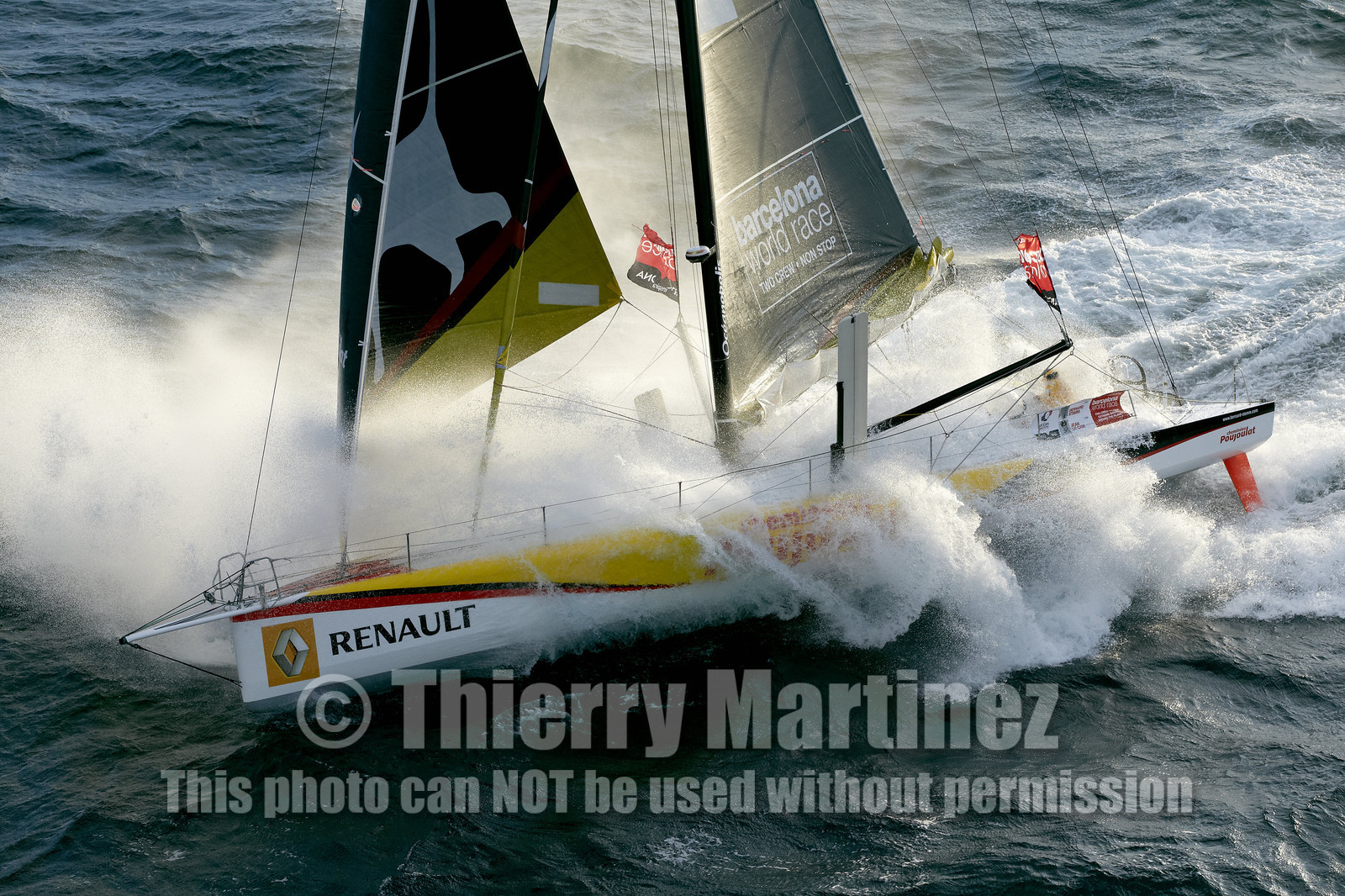 2014 BARCELONA WORLD RACE. Bernard Stamm (SUI) & Jean Le Cam (FRA) on CHEMINEES POUJOULAT