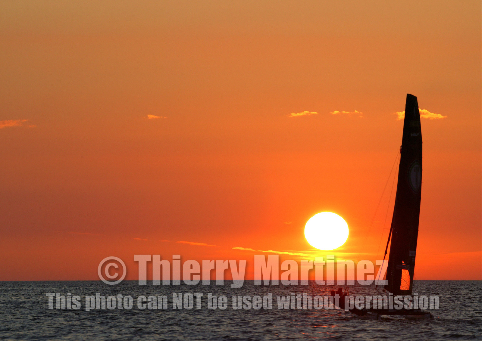 03_3096D © Th.Martinez,STOCKHOLM ARCHIPELAGO SWEDEN,9 07 03-Archipelago Raid (2003)  Leg 2.First sunrise on Archipelago Raid 2003. TIDERMANS Anders Lewander (SWE) & Calle Hendix (SWE)