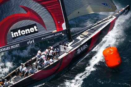 03_0908D © Th.Martinez. Auckland   New Zealand. 15 02 03 America's Cup Day 1.Alinghi (SUI64) vs Team New Zealand (NZL82) SU64 rounding the first mark while Team New Zealand is heading back to the base because of gear failure.