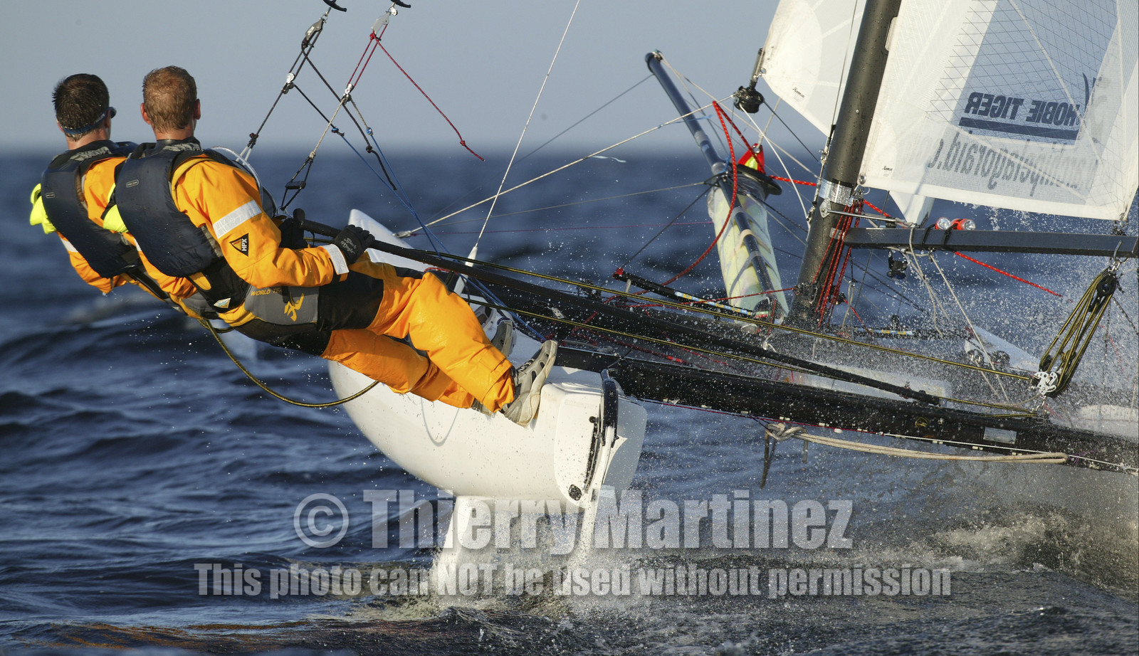 03_3070D   © Th.Martinez,STOCKHOLM ARCHIPELAGO SWEDEN, 8 07 03-Archipelago Raid (2003)  Day 1. Team NOKIA-Adilstam  .Frederik Aldistam (SWe) and Tomas Marimon (SWE) at the helm..