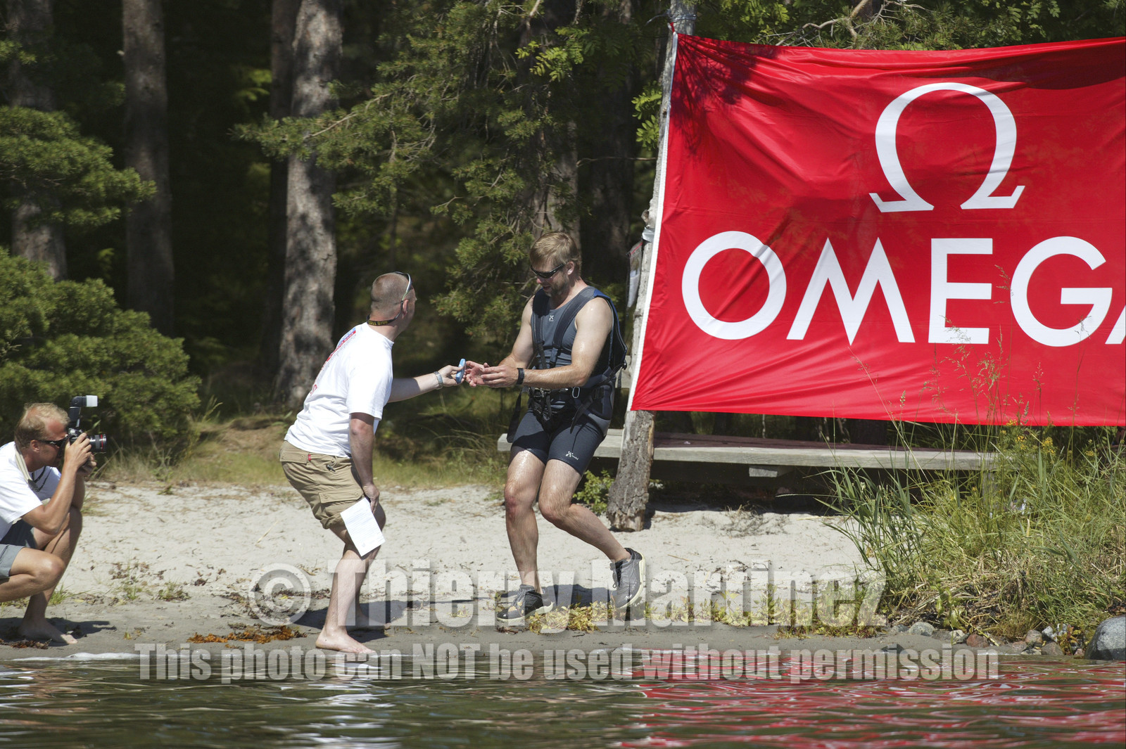 03_3053D © Th.Martinez,STOCKHOLM ARCHIPELAGO SWEDEN, 8 07 03-Archipelago Raid (2003)  Day 1..TIDERMANS  Calle Hendix (SWE), running at a check-point .